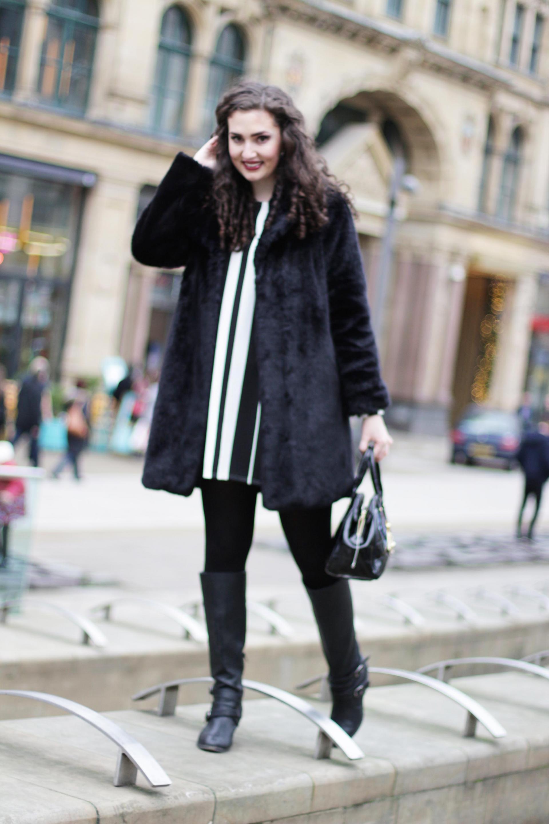 monochrome swing dress and black faux fur coat