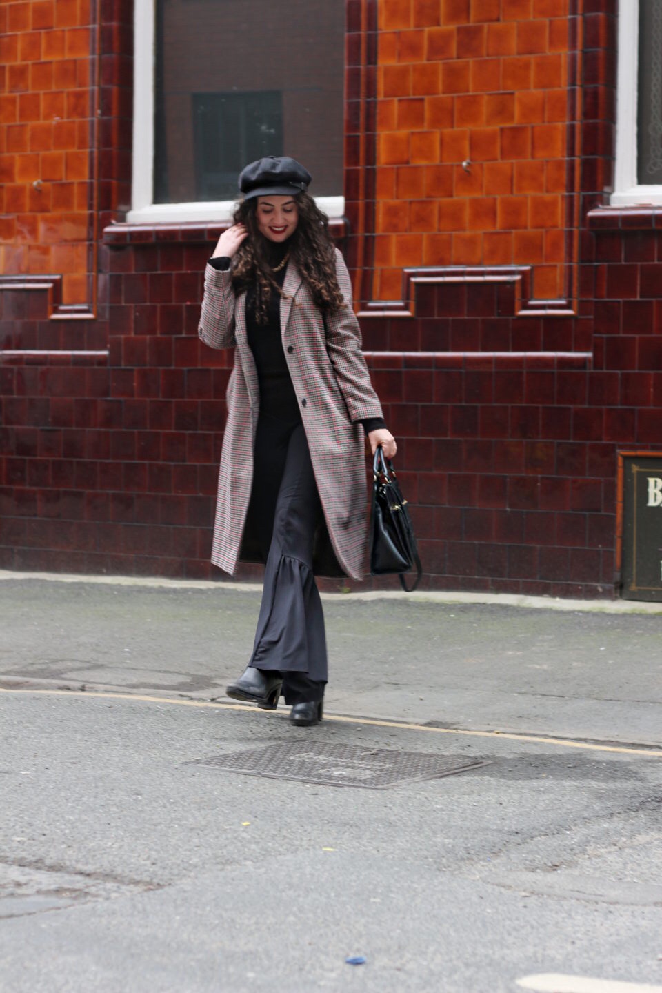 checked longline duster coat and flared trousers